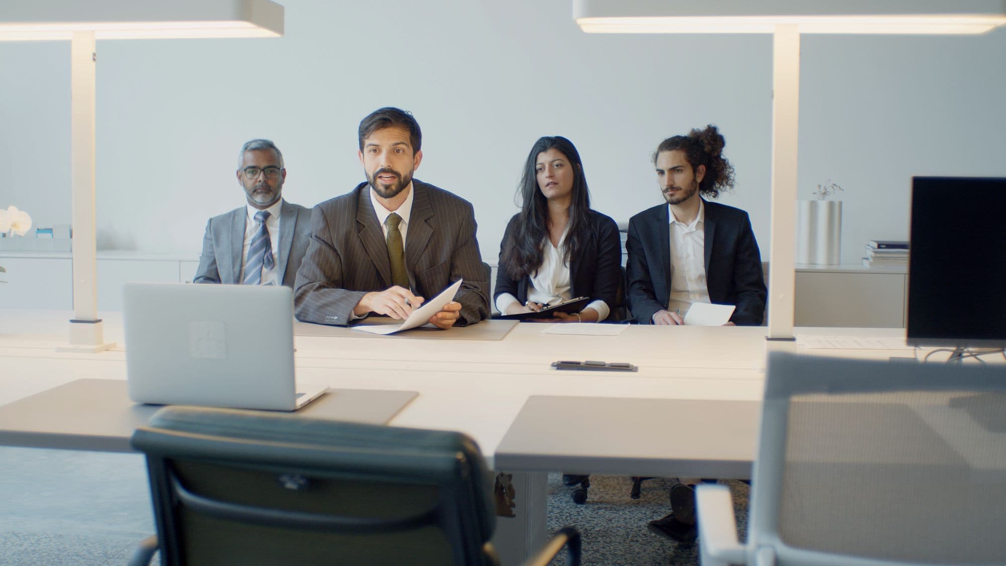 Research professionals reviewing a study brief